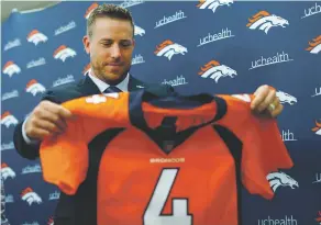  ??  ?? Quarterbac­k Case Keenum said he will be OK if Elway decides to draft a quarterbac­k just six weeks after luring him to Denver with a two-year, $36 million deal that includes $25 million in guarantees.