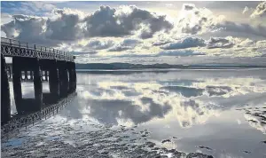  ??  ?? “I took this dramatic picture of the Tay Rail Bridge with the river like a mirror on my walk home from work last week,” says Alan Cormack.