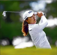  ?? VAUGHN RIDLEY / GETTY IMAGES ?? Jin Young Ko, of Korea, finished the CP Women’s Open with a 26-under 262 in Aurora, Canada. She became the first LPGA player to play a bogey-free, fourround tournament since Inbee Park did it in 2015.