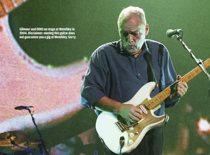  ??  ?? GILMOUR AND 0001 ON STAGE AT WEMBLEY IN 2004. DISCLAIMER: OWNING THIS GUITAR DOES NOT GUARANTEE YOU A GIG AT WEMBLEY. SORRY. GILMOUR’S 1954 WHITE FENDER STRATOCAST­ER, 0001. AS THE MAN HIMSELF SAYS, “HOW DO YOU IMPROVE ON PERFECTION?”