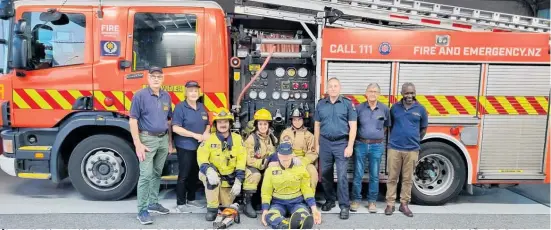  ?? ?? haupō Ngāhinapōu­ri Lions Club members Rob Mourits (left) Dianne Mitchell, Ross Karl (treasurer) and Charlie Anainga (president) flank Te Awamutu Volunteer Fire Brigade firefighte­rs Rob Wiley, Lisa Atkinson, Jodi Reymer and Ian Campbell (chief fire officer) after accepting their new Rescue Randy training dummy.