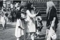  ??  ?? THE BIGGER PICTURE
(Top) Shivendra with Amitabh Bachchan, who’s the ambassador of his non-profit body; (above) a poster of
India's first feature film, Raja Harishchan­dra