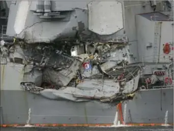  ?? THE ASSOCIATED PRESS ?? Damaged part of USS Fitzgerald is seen at the U.S. Naval base in Yokosuka, southwest of Tokyo Sunday, June 18, 2017. Navy divers found a number of sailors’ bodies Sunday aboard the stricken USS Fitzgerald that collided with a container ship Saturday in...