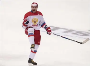  ?? IVAN SEKRETAREV — THE ASSOCIATED PRESS FILE ?? Russia’s Ilya Kovalchuk celebrates after scoring during the second period action of the Channel One Cup ice hockey match against Finland, in Moscow, Russia on Dec. 19, 2015. A combinatio­n of factors has made the NHL assimilati­on for Russian players...