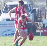  ??  ?? Connor Dastey puts his head over the ball during the under 16 match against Newborough.