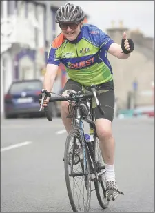  ??  ?? Well known GAA activist John Fintan Daly, Knocknagre­e giving a big thumbs up for the camera lens.