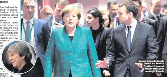  ??  ?? German Chancellor Angela Merkel and France’s President Emmanuel Macron at the EU27 meeting in Brussels