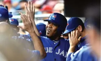  ?? ERIC HARTLINE/USA TODAY SPORTS ?? Blue Jay Edwin Encarnacio­n continued his torrid pace with a homer and three runs scored against the Phillies.