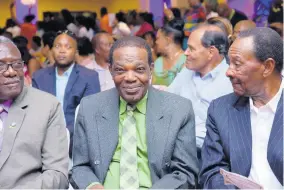 ??  ?? In keeping with the theme of Hilton Rose Hall Resort’s annual Excellence Awards, former employees Joe Hylton (centre) and Jimmy Wright (right) were in attendance, along with Custos Conrad Pitkin, who also has a long history with the resort. They are pictured enjoying the awards ceremony.