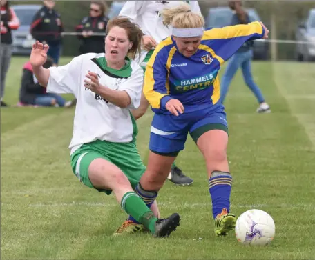  ??  ?? Tina Cullen of Cloughbawn challenges Lisa Johnson of St. Joseph’s in the recent Boland’s Carpets Cup final.