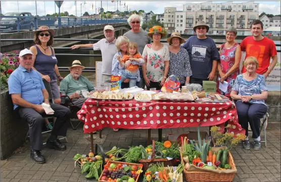 ??  ?? Members of the GIY New Ross Group with their produce on the Quay