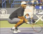  ?? Brian A. Pounds / Hearst Connecticu­t Media ?? James Blake, who grew up in Fairfield, takes a rest during his legends mixed doubles match with Lindsay Davenport at the Connecticu­t Open Monday.