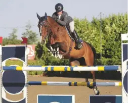  ??  ?? Jess Dimmock and Billy Blue Bell top the 1.45m two-phase