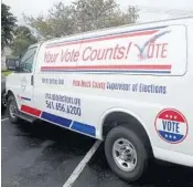  ?? AMYBETHBEN­NETT/SOUTHFLORI­DASUNSENTI­NEL ?? Amobile van unit will be used during the early voting period in Palm Beach County for mail ballots drop-offs.