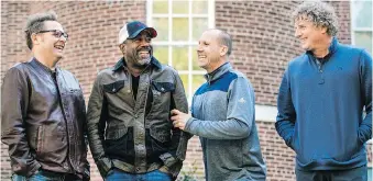  ?? SEAN RAYFORD/THE ASSOCIATED PRESS ?? Hootie &amp; the Blowfish members Dean Felber, left, Darius Rucker, Jim Sonefeld and Mark Bryan are feeling reinvigora­ted and are ready to tour after being dormant for years.