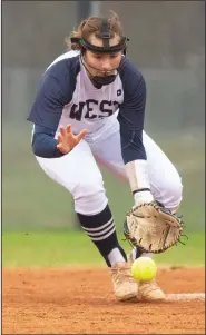  ?? (Special to NWA Democrat-Gazette/David Beach) ?? Carlee Durham of Bentonvill­e West fields the ball against Springdale on March 18 in Centerton.