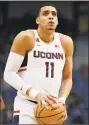  ?? Jessica Hill / AP ?? UConn’s Kwintin Williams has created some buzz with videos of his dunks on the internet.