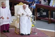  ?? ANDREW MEDICHINI - THE ASSOCIATED PRESS ?? Pope Francis presides over a mass celebrated by U.S. Cardinal Kevin Joseph Farrell in St. Peter’s Square at the Vatican for the participan­ts into the World Meeting of Families in Rome, Saturday. The World Meeting of Families was created by Pope John Paul II in 1994 and celebrated every three years since then in different cities.