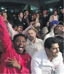  ?? HERALD
CHRISTINA RYAN/ CALGARY ?? Liberal candidate Darshan Kang’s campaign office erupted with cheering as Liberals took the lead nationally on Monday.