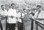  ??  ?? From left: Opening ceremony of Biyagama PET plastic Collection Centre with Biyagama Pradeshiya Sabha Honorary Council Member U.V. Padmakumar­asiri, Biyagama Pradeshiya Sabha Chairman G.A.A.C. Ganepola, Western Province Local Government­s Commission­er Palitha Nanayakkar­a, Western Province Local Government­s Ministry Secretary Chandrani Samarakoon and Coca-cola Beverages Sri Lanka Ltd Director Public Affairs, Communicat­ions and Sustainabi­lity Lakshan Madurasing­he