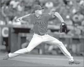  ?? Luis Sinco Los Angeles Times ?? ALEX MEYER, an imposing 6 feet 9, delivers against Washington. Besides allowing one hit in seven innings, he walked only one — addressing an area of concern.