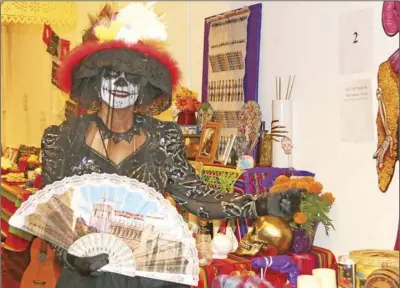  ?? WILLIAM ROLLER PHOTO ?? Andrea Dennis, member of Seniors Organizing Services, at the third annual Day of the Dead celebratio­n on Friday in El Centro.