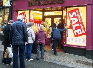  ??  ?? People queuing outside McKeon’s following news that it is closing.