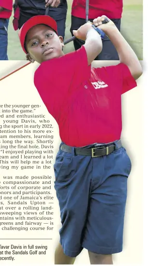  ?? ?? Junior golfer Tavar Davis in full swing as he tees off at the Sandals Golf and Jerk Festival recently.