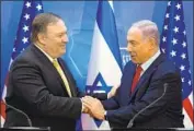  ?? Sebastian Scheiner Pool Photo ?? SECRETARY of State Michael R. Pompeo said Iran was a focus of talks with Benjamin Netanyahu, right.