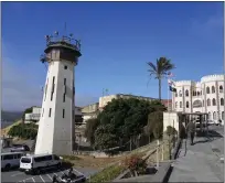 ?? ERIC RISBERG/ASSOCIATED PRESS ?? A correction­al officer heads to work at San Quentin State Prison. An advisory council said Gov. Gavin Newsom's $360million proposal for a new prison building should be cut by at least a third.