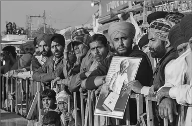  ??  ?? Farmers protesting at Singhu border outside New Delhi. (Photo: Al Jazeera)