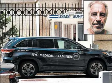  ?? DON EMMERT/GETTY-AFP ?? A New York City medical examiner’s car is parked Saturday outside the jail where financier Jeffrey Epstein was being held.