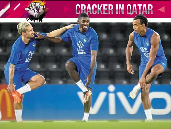  ?? — ap/reuters ?? Warming up: (from left) antoine Griezmann, ousmane dembele and Jules Kounde stretching during France’s training session at the Jassim bin Hamad stadium. Below: France’s ever reliable striker Kylian mbappe.