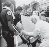  ?? WALTER KALE/CHICAGO TRIBUNE ?? During the heat wave of 1995, a 101-year-old woman was overcome when an electrical fire knocked out the power in her apartment building.