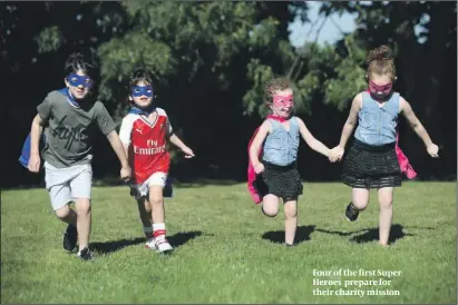  ?? PHOTO: MARC MORRIS ?? Four of the first Super Heroes prepare for their charity mission