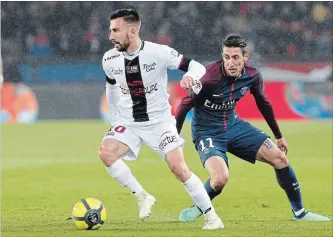  ?? CANADIAN PRESS FILE PHOTO ?? Toronto FC has signed French winger Nicolas Benezet, left, acquired on loan from France’s Guingamp.