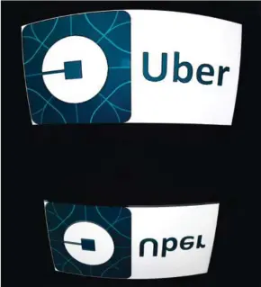  ?? BONAVENTUR­E/AFP LIONEL ?? Ride-hailing app Uber may be a pioneer in its field but at heart it is an ordinary taxi company and should be regulated as such, a top EU lawyer said yesterday.