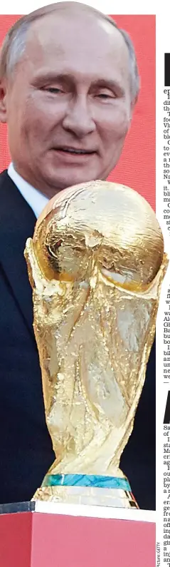  ??  ?? Cynical: Russia’s Vladimir Putin with the World Cup