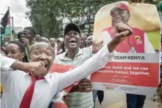 ?? — AFP ?? Supporters of President Uhuru Kenyatta celebrate on Monday in Nairobi after Supreme Court dismissed two petitions to overturn the country’s October 26 presidenti­al election re-run, validating the poll victory of Kenyatta.