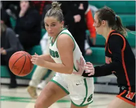  ?? ?? Columbia’s Elise Champagne drives against Normandy’s Savannah Hardy during the third quarter on Nov. 28. (Randy Meyers - For The Morning Journal