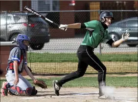  ?? RANDY MEYERS — FOR THE MORNING JOURNAL ?? Columbia’s Trevor Hottell fouls off a pitch during the first inning against Open Door on April 9.