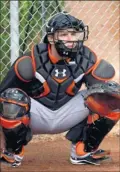  ?? By Rick Scuteri, US Presswire ?? Back in gear: Giants catcher Buster Posey works out at camp Sunday.