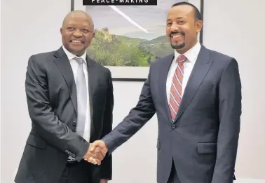  ?? Supplied ?? DEPUTY President David Mabuza, left, in his capacity as a Special Envoy to South Sudan, yesterday met Dr Abiy Ahmed Ali, Prime Minister of the Federal Democratic Republic of Ethiopia and chairperso­n of the Intergover­nmental Authority on Developmen­t (IGAD) to push for full implementa­tion of the Revitalise­d Peace Agreement on South Sudan.