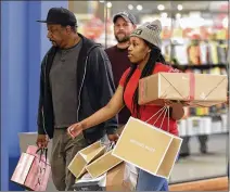  ?? CHUCK BURTON / ASSOCIATED PRESS 2017 ?? Consumer spending revived in the past two months after a weak January and February, a trend that may aid growth in the AprilJune quarter.