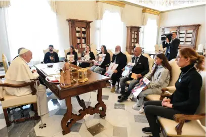  ?? (Vatican/Reuters) ?? POPE FRANCIS meets families of Israeli hostages held by Hamas, at the Vatican yesterday.