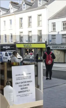  ?? Pics: ?? The reality at present, with one person at a time being allowed into Ward’s Pharmacy on O’Connell Street, Sligo. Donal Hackett.