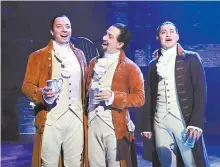  ?? AP-Yonhap ?? This image released by NBC shows Jimmy Fallon, host of “The Tonight Show Starring Jimmy Fallon,” left, with Lin-Manuel Miranda, center, and a member of the cast from the musical “Hamilton,” at the Luis A. Ferr Performing Arts Center in San Juan, Puerto Rico.