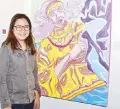  ??  ?? Visual artist, photograph­er and award- winning filmmaker Mia Reyes beside her “The Story Teller” painting