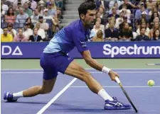  ?? AP ?? ON A MISSION: Novak Djokovic plays a return against Jenson Brooksby during the fourth round of the U.S. Open in New York on Monday night.