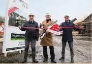  ??  ?? Hyndburn Council leader Miles Parkinson (centre) at Rhoden Park with Property Shop joint managing directors Steven Chippendal­e (left) and Jamie Allen